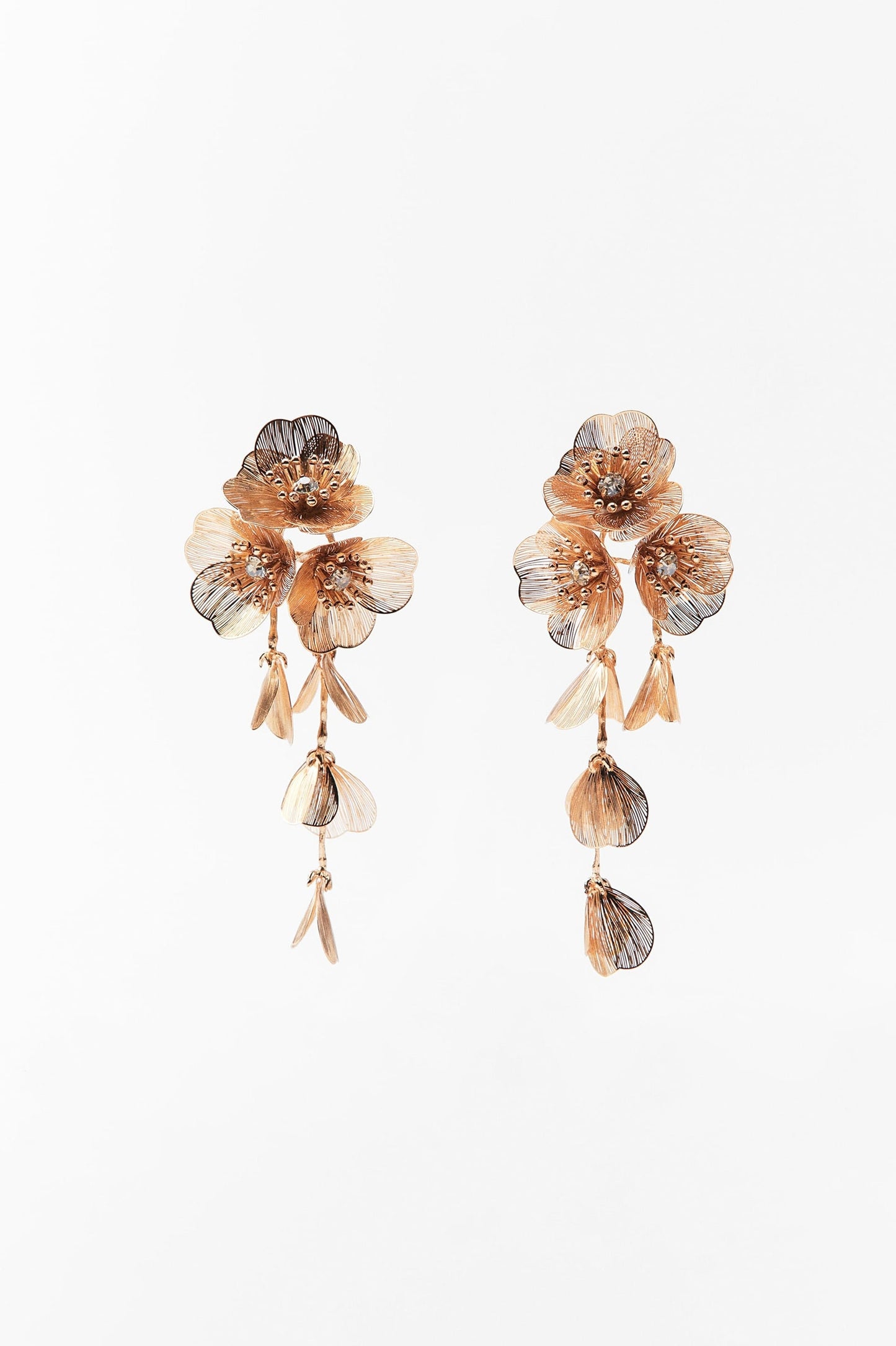 Floral cascading earrings and necklace set in gold and silver.