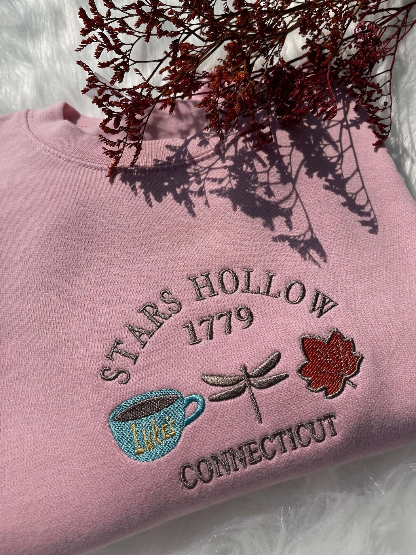 Stars Hollow embroidered crewneck with 'Where You Lead, I Will Follow' design