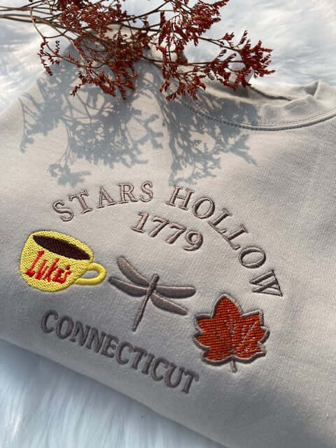Stars Hollow embroidered crewneck with 'Where You Lead, I Will Follow' design