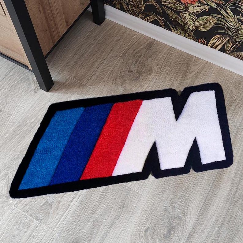 BMW racing car rug in a stylish garage setting
